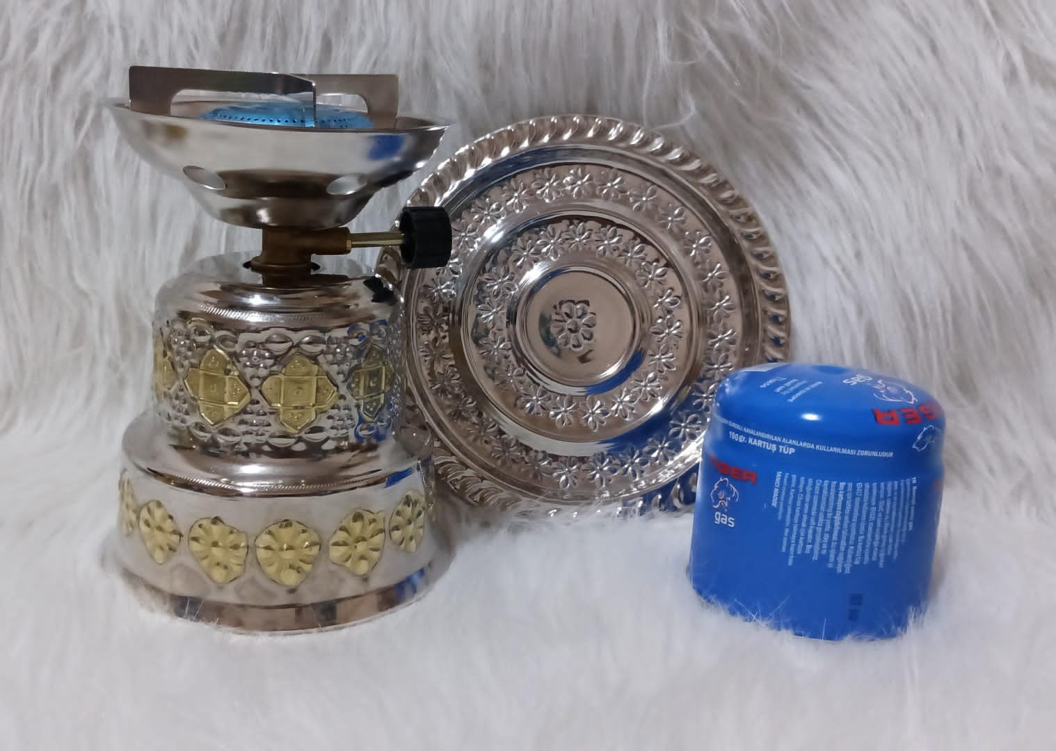 بوطة غاز صغيرة مع غطاء راقي